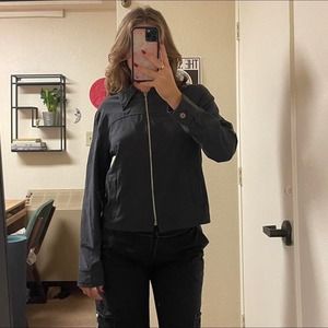 the black zip up collared long sleeve shirt